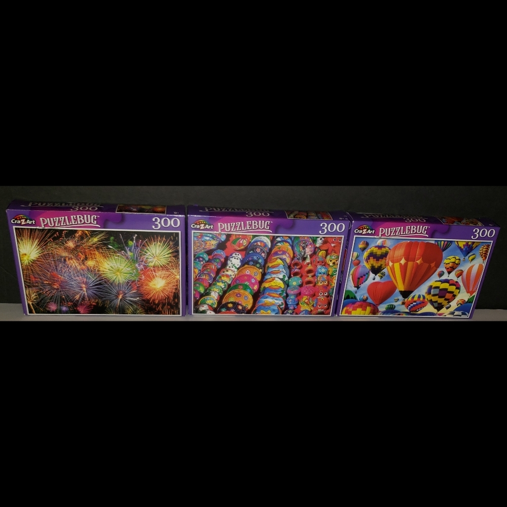 NIB (3) PuzzleBug 300 Piece Puzzles